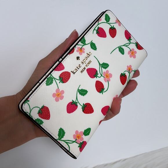 kate spade Handbags - NWT Kate Spade Madison Strawberry Vine Large Slim Bifold Wallet